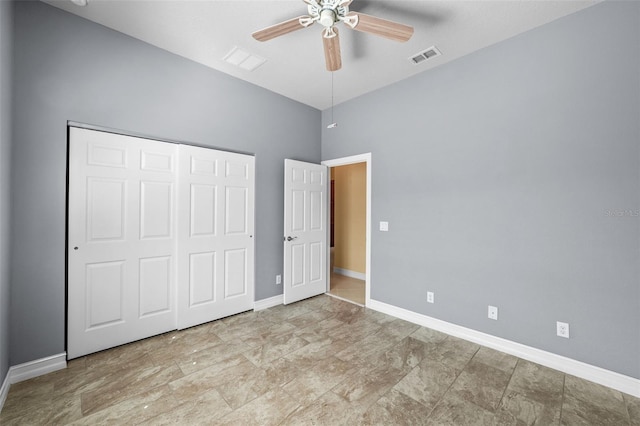 unfurnished bedroom featuring visible vents, baseboards, a closet, and ceiling fan