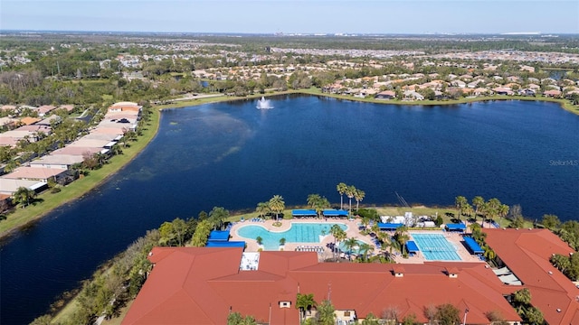 birds eye view of property featuring a water view