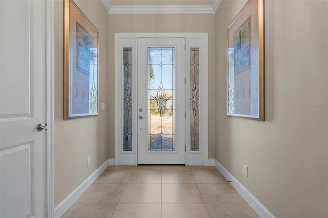 entryway with crown molding, light tile patterned floors, and baseboards