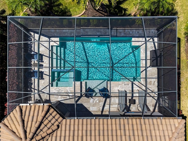 outdoor pool with glass enclosure