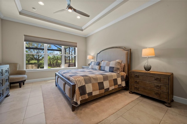 bedroom featuring light tile patterned floors, a ceiling fan, baseboards, ornamental molding, and a raised ceiling