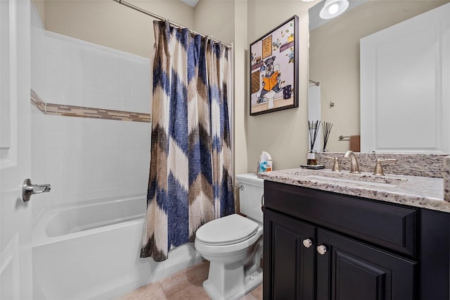 bathroom with toilet, shower / tub combo with curtain, vanity, and tile patterned flooring