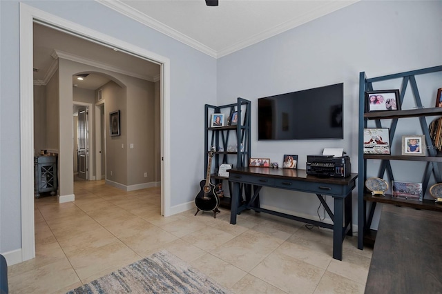 office with arched walkways, light tile patterned floors, crown molding, and baseboards