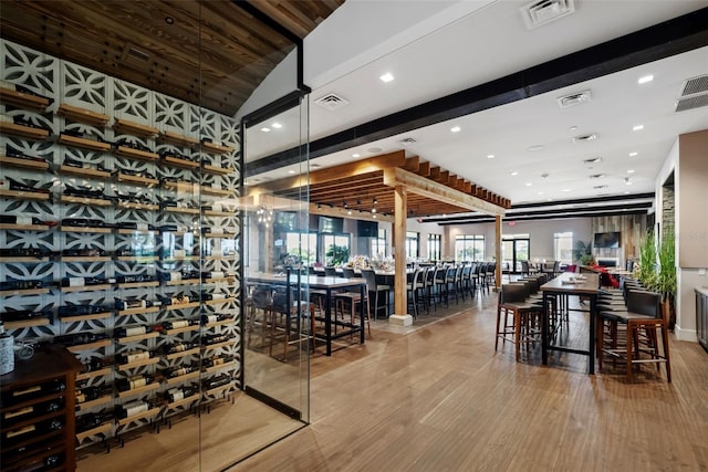 interior space with wood finished floors and visible vents