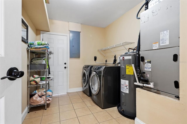 laundry area with light tile patterned floors, laundry area, electric panel, water heater, and washer and clothes dryer