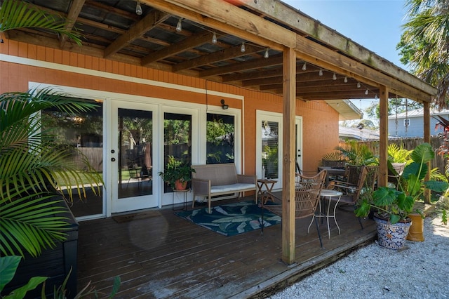 wooden terrace featuring french doors