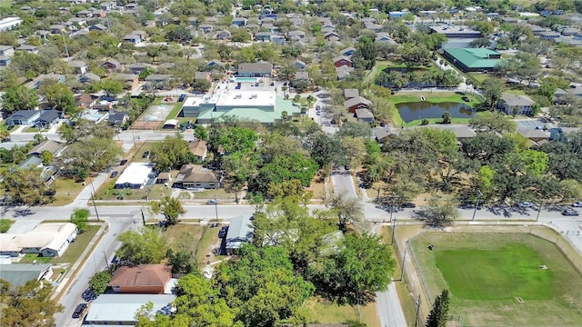 birds eye view of property with a residential view and a water view