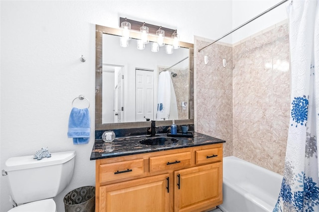 bathroom with shower / bath combo, vanity, and toilet