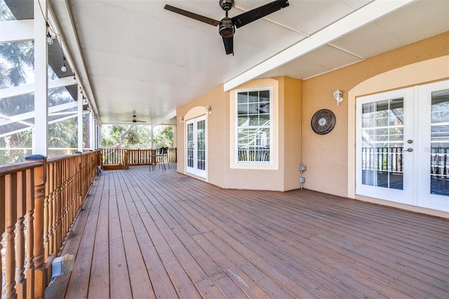 deck featuring french doors and ceiling fan