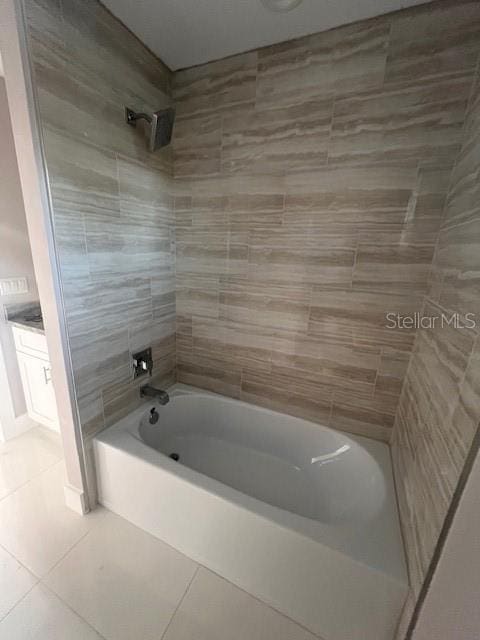 full bathroom featuring tub / shower combination and tile patterned floors