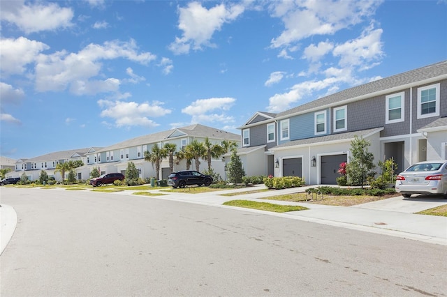 view of road with sidewalks and a residential view