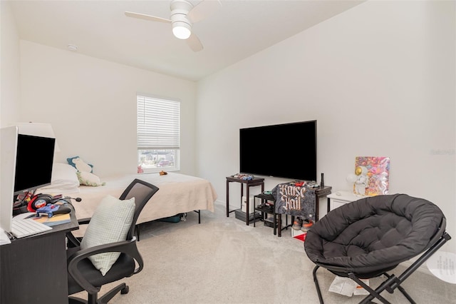 carpeted office featuring ceiling fan