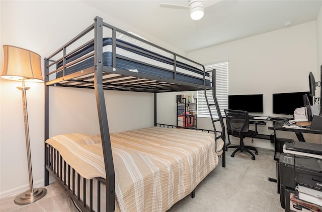 carpeted bedroom with baseboards