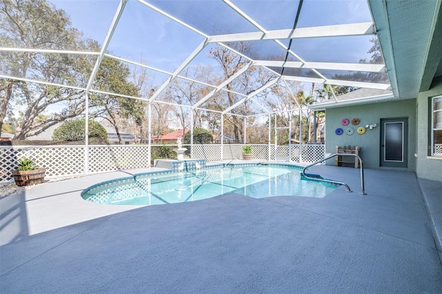 view of swimming pool featuring a lanai, a fenced in pool, and a patio