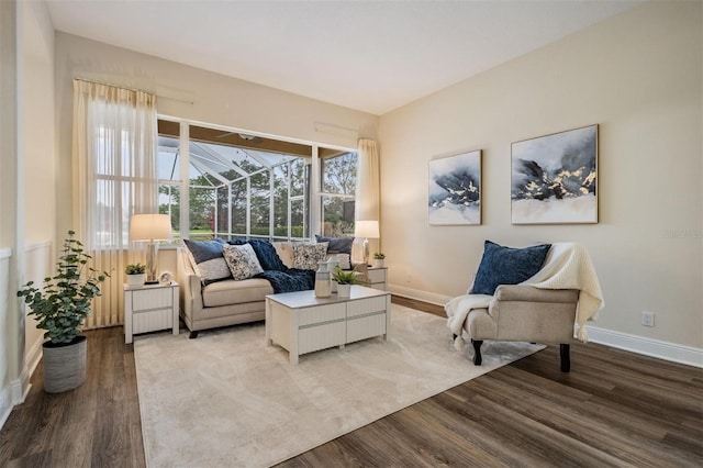2665 Lakebreeze Ln N, Clearwater, FL 33759 - living room featuring light wood-style flooring and a sunroom