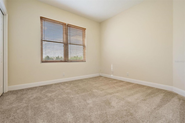 2665 Lakebreeze Ln N, Clearwater, FL 33759 - carpeted empty room with baseboards