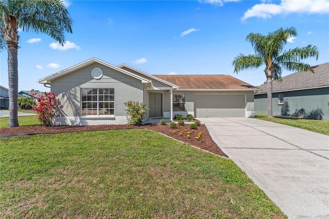 single story home with driveway, stucco siding, an attached garage, and a front yard