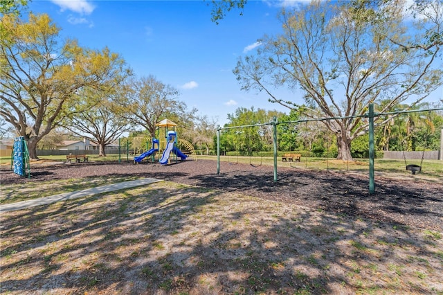 community jungle gym with fence