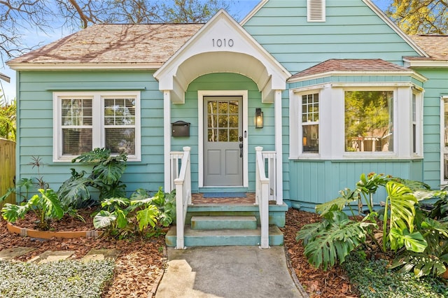 view of front of house featuring a shingled roof