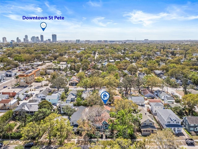 birds eye view of property featuring a city view