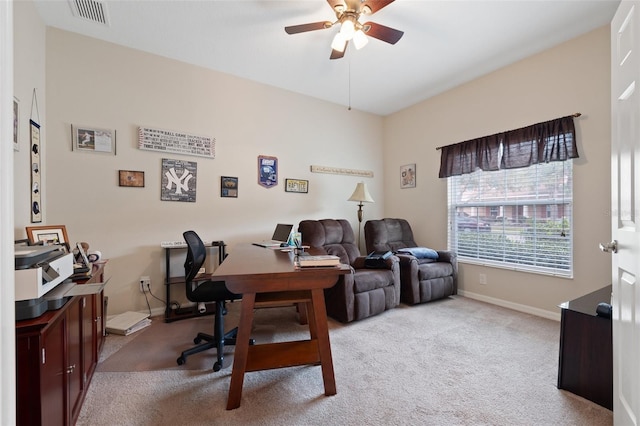 office with light carpet, a ceiling fan, visible vents, and baseboards