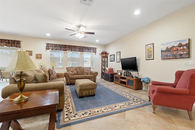 tiled living room featuring a ceiling fan, recessed lighting, and visible vents