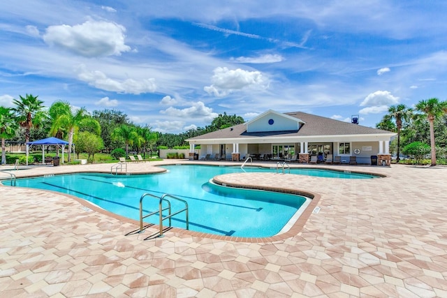 pool with a patio area