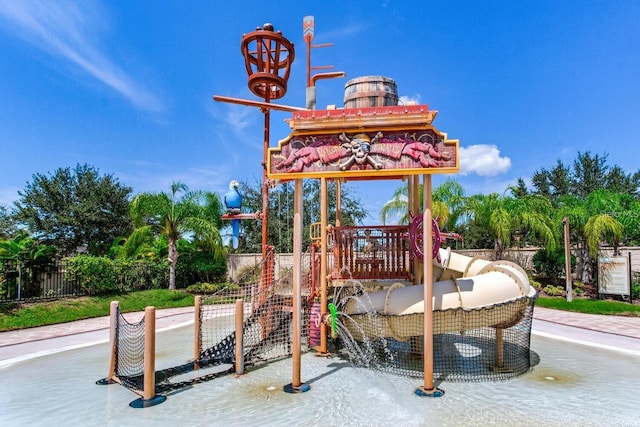 community play area featuring fence