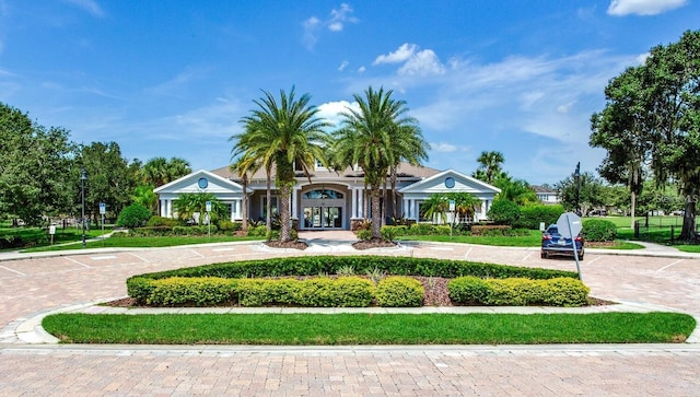 view of home's community featuring uncovered parking