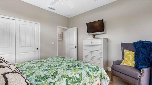 135 Cabana Way, Rotonda West, FL 33947 - bedroom with a closet, wood finished floors, ceiling fan, and baseboards
