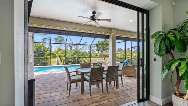 135 Cabana Way, Rotonda West, FL 33947 - sunroom / solarium with baseboards and a textured ceiling