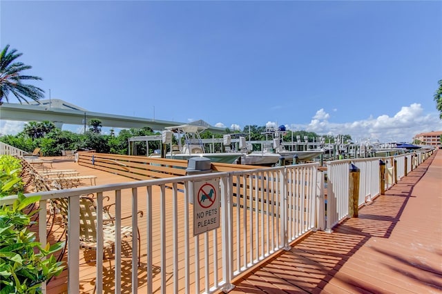 balcony with a boat dock and boat lift