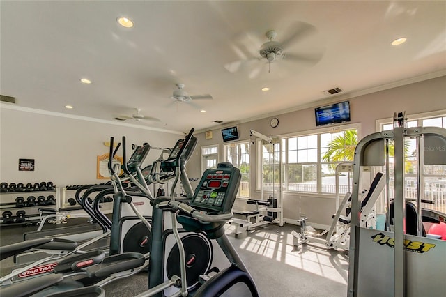 exercise room featuring ornamental molding, recessed lighting, visible vents, and baseboards