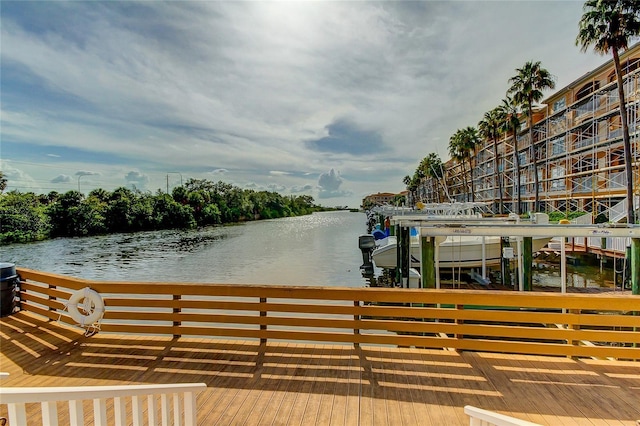 view of dock featuring a water view and boat lift