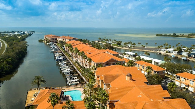 birds eye view of property featuring a water view