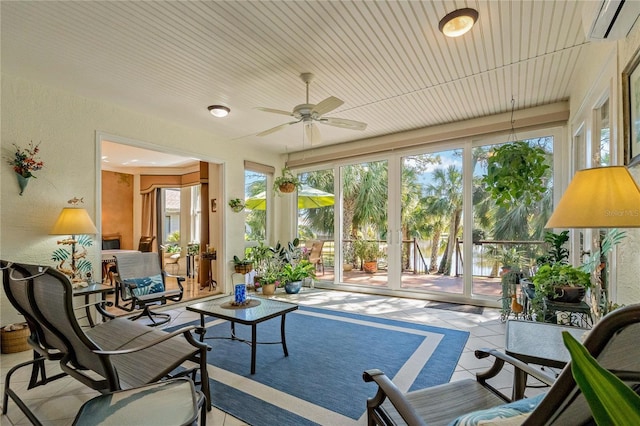 sunroom / solarium with a wall mounted air conditioner