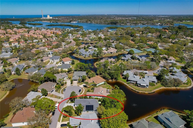 aerial view featuring a water view and a residential view