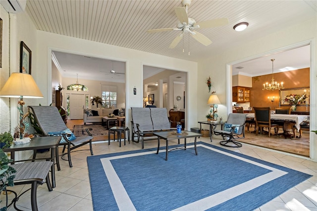 interior space with light tile patterned floors, ceiling fan with notable chandelier, crown molding, and a wall mounted AC