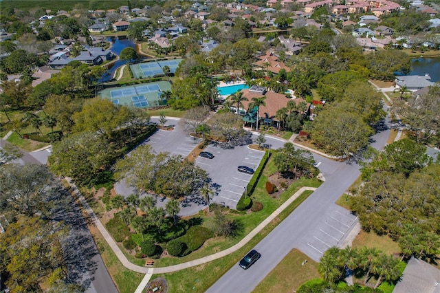 birds eye view of property with a residential view