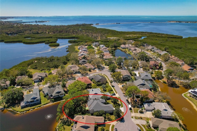 aerial view with a water view and a residential view