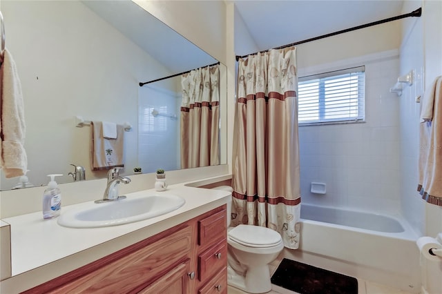 full bath with shower / bath combo, vanity, and toilet