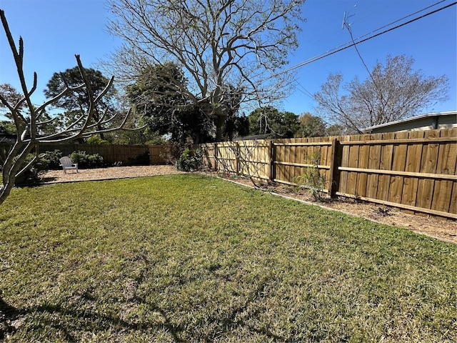 view of yard featuring a fenced backyard