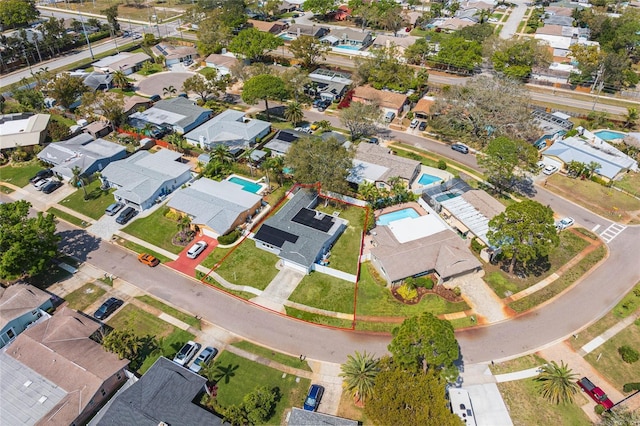 birds eye view of property with a residential view