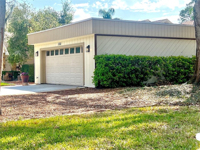 garage featuring driveway