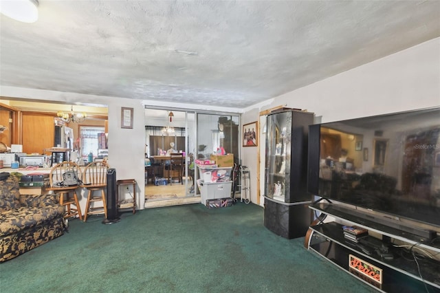 carpeted living room with a notable chandelier