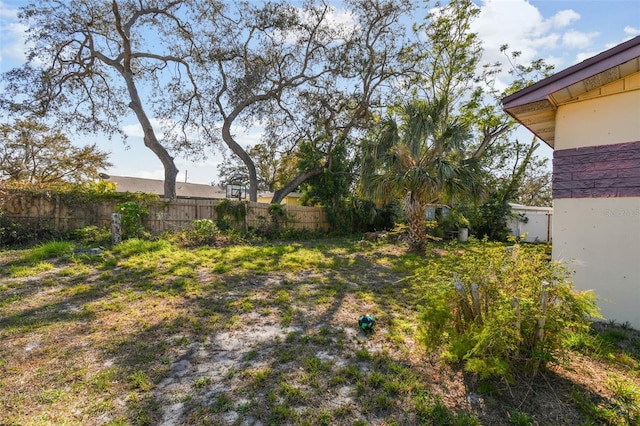 view of yard featuring fence