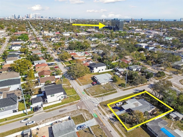 birds eye view of property with a city view