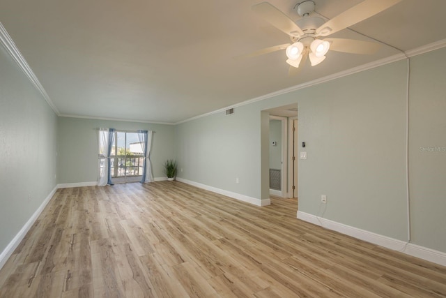 unfurnished room with light wood finished floors, visible vents, baseboards, a ceiling fan, and ornamental molding