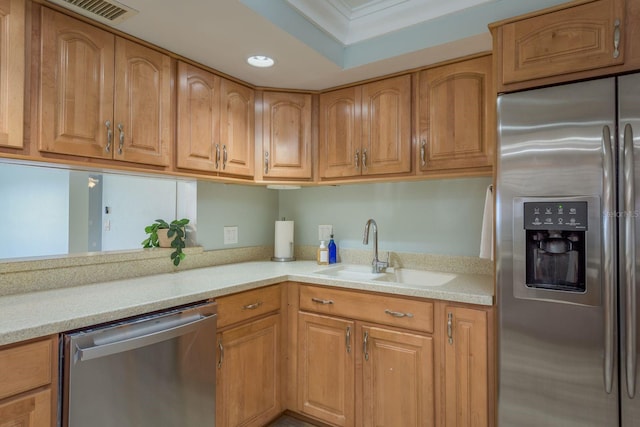 kitchen featuring visible vents, appliances with stainless steel finishes, light countertops, a sink, and recessed lighting