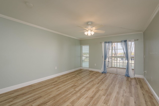 unfurnished room with light wood finished floors, baseboards, a ceiling fan, and ornamental molding